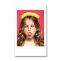Pocket Instax Mini style photo print of a girl with a banana on her head against a pink background
